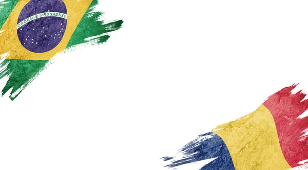 白色背景下的巴西和罗马尼亚国旗 — 图库照片